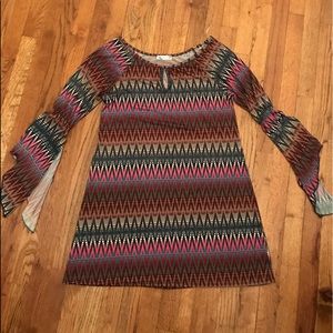 Patterned bell sleeve dress.